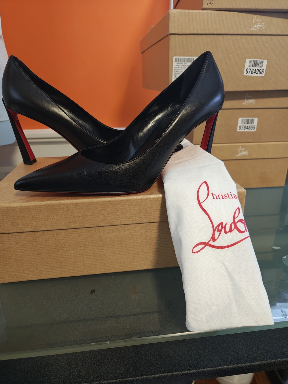 Christian Louboutin Black Leather Pointed Toe Pumps with Red Sole